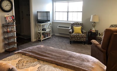 Cozy interior of a resident room with furnishings