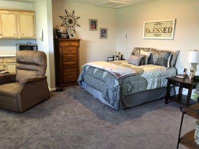 Cozy private resident bedroom with personal decor
