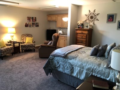 Cozy interior of a resident's room with seating area