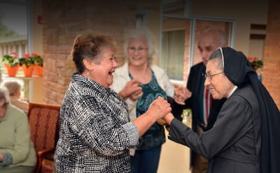 Residents enjoying time together in a common area