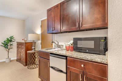Interior of a resident's kitchenette with modern appliances