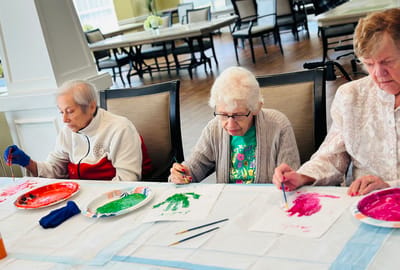 Residents engaged in an arts and crafts activity