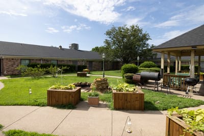 Outdoor garden space with seating and landscaping