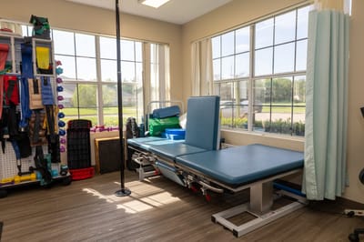 Therapy room with exercise equipment and natural light