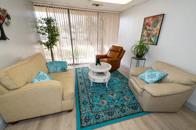 Cozy common area with chairs and decorative elements