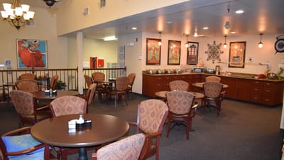 Dining room with seating and food setup