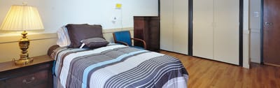 A furnished private room in a nursing home