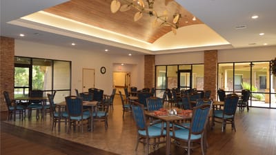 Bright dining room with wooden tables and chairs