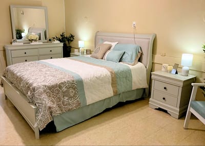 Well-decorated private bedroom in assisted living facility