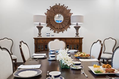 Dining area with a beautifully set table and food