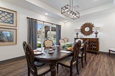 Elegant dining area with a table set for a meal