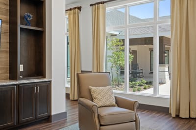 Lounge area with seating and large windows