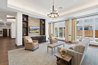 Interior common area with seating and natural light