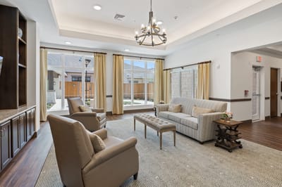 Bright common area with seating and natural light