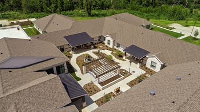 Aerial view of a landscaped senior living courtyard