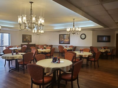 Bright dining room with tables and chairs