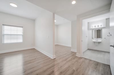 Bright and spacious resident room with an adjacent bathroom
