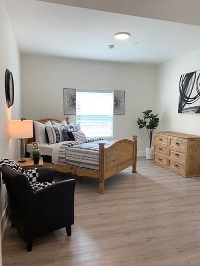 A cozy private resident room with modern furniture