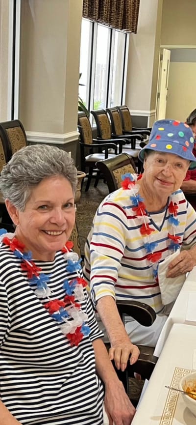 Residents celebrating with festive attire in a common area