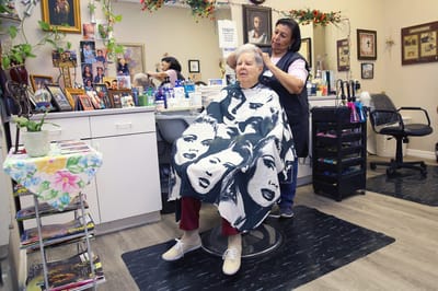 Resident getting a haircut in the salon