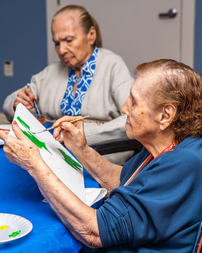 Residents participating in an art activity