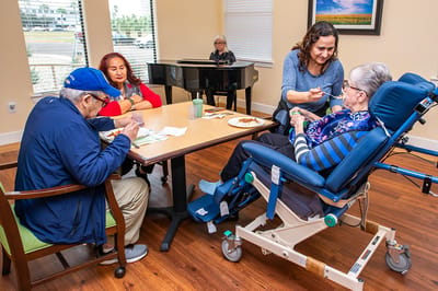 Residents enjoying a meal and activity together