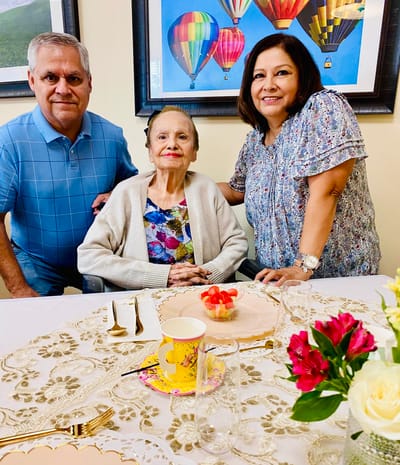 Family visiting a resident during meal time