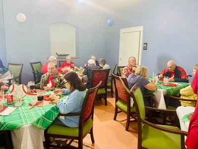 Residents dining in a cheerful cafeteria setting