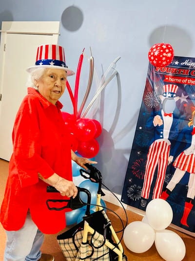 Resident celebrating with festive decorations