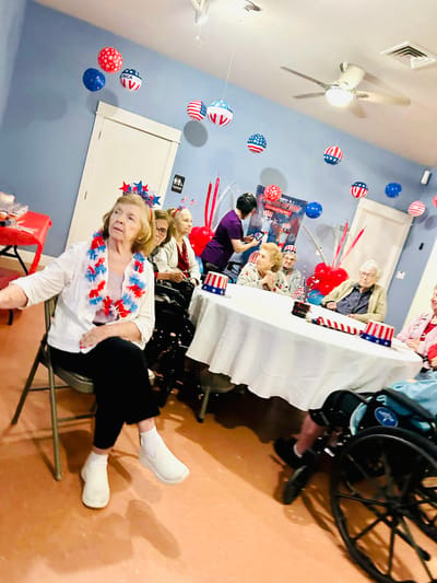 Residents celebrating with decorations in a common area