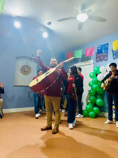 Musicians performing during an event in the common area