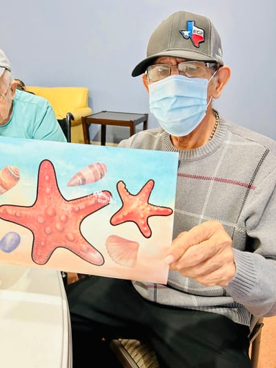 Resident engaging in an activity indoors