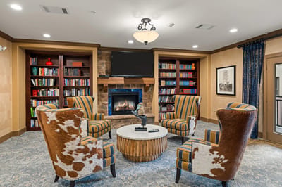 Cozy common area with seating and a fireplace