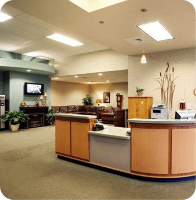 Bright interior lobby with seating and reception desk