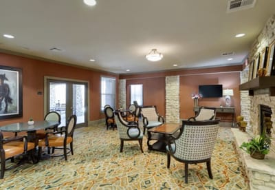Bright common area with seating and artwork