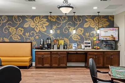 Cozy lounge area with beverages and snacks