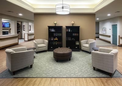 Common area with seating and bookshelves