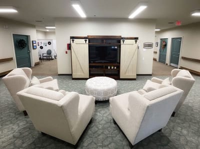 Cozy seating area with chairs around a coffee table