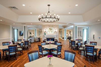 Bright dining area with tables and chairs