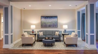 Cozy common area with seating and artwork