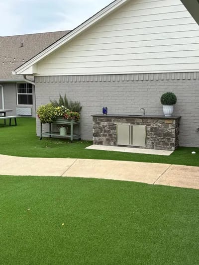 Well-maintained outdoor space with landscaping
