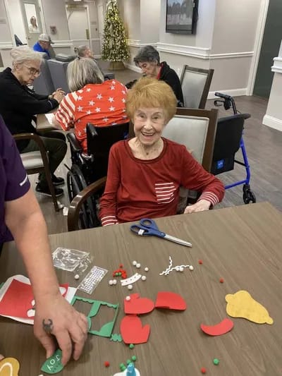 Residents engaging in an activity at a table