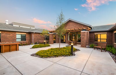 Courtyard of The Sycamore with benches and landscaping