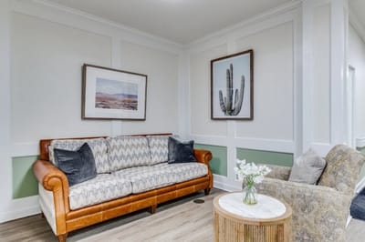 Interior lounge area with comfortable seating and decor