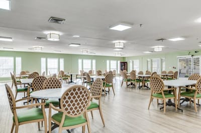 Bright dining room with tables and chairs