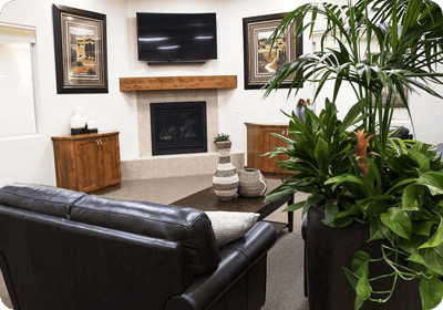 Inviting common area with comfortable seating and plants