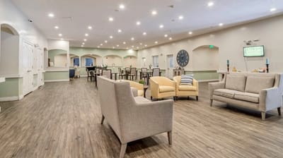 Bright common area with modern seating and decor