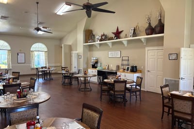 Interior dining room with tables set for a meal