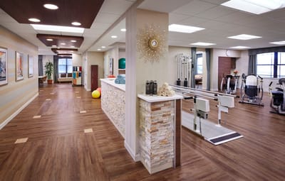 Interior view of a rehabilitation gym with exercise equipment