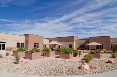 Outdoor garden area with seating and landscaping